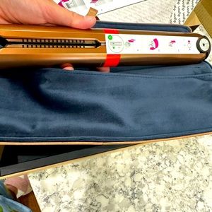 Brand new - out of the box Dyson Corrale straightener!